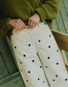 detail fermeture pantalon femme taille haute boutonniere et ceinture finition propre couture