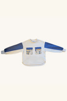Sweat Simone fleuri bleu marine à poches de Maéli Paris.